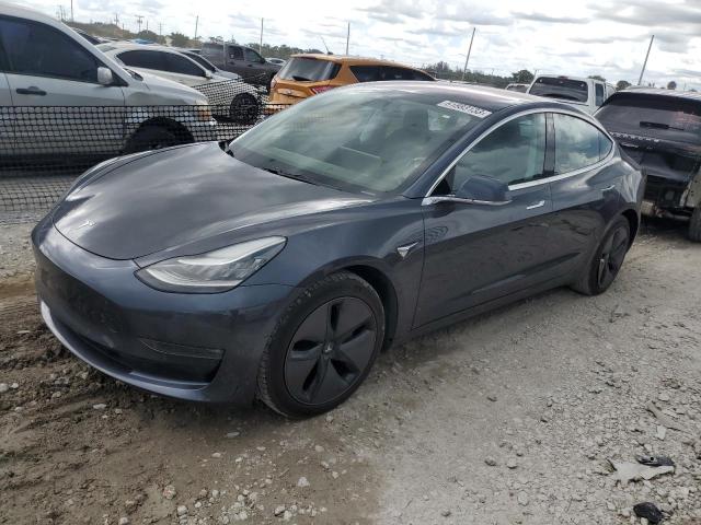 TESLA MODEL 3 2018 with VIN 5YJ3E1EAXJF123619 - Photo from auction