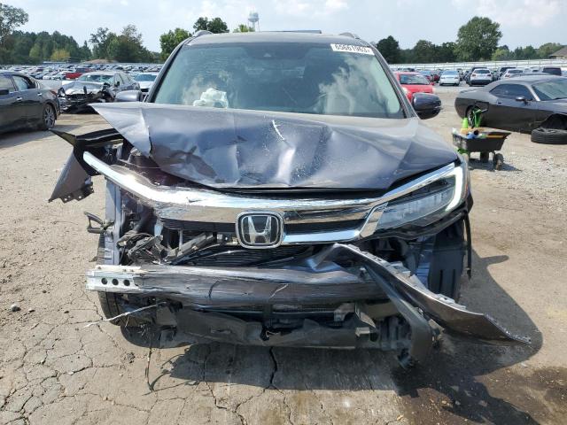 Photo 5 from auction – 2019 HONDA PILOT TOUR with VIN 5FNYF5H69KB020422