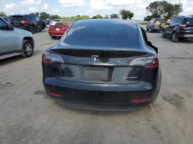 Снимка 6 от търг – 2021 TESLA MODEL 3 с VIN 5YJ3E1EBXMF848926