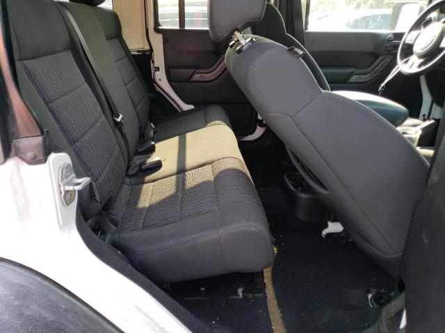 Photo 11 from auction – 2011 JEEP WRANGLER U with VIN 1J4HA3H12BL599672