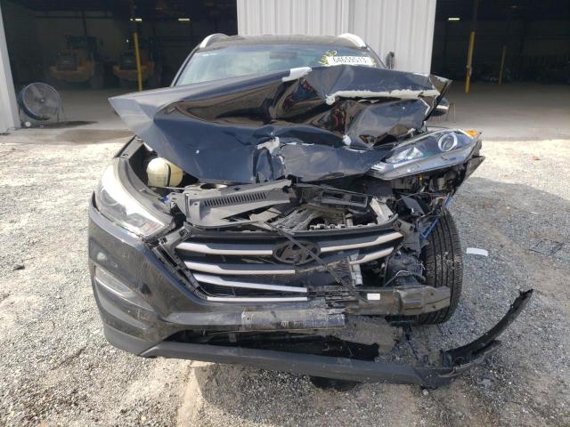 Photo 5 from auction – 2017 HYUNDAI TUCSON LIM with VIN KM8J3CA48HU474292