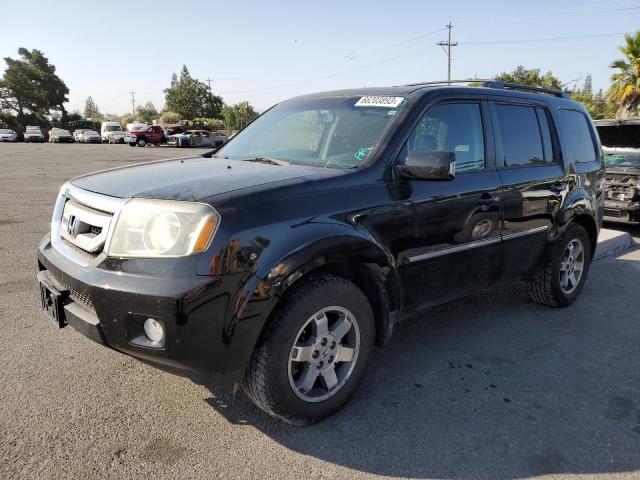 HONDA PILOT TOUR 2011 with VIN 5FNYF4H96BB023315 - Photo from auction