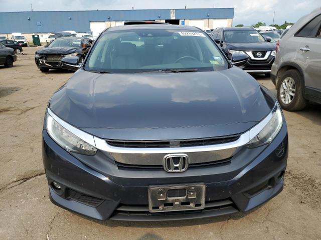 Photo 5 from auction – 2017 HONDA CIVIC TOUR with VIN 19XFC1F98HE005754