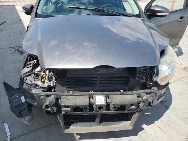 Foto 11 de la subasta – 2014 FORD FOCUS SE con VIN 1FADP3K21EL301367