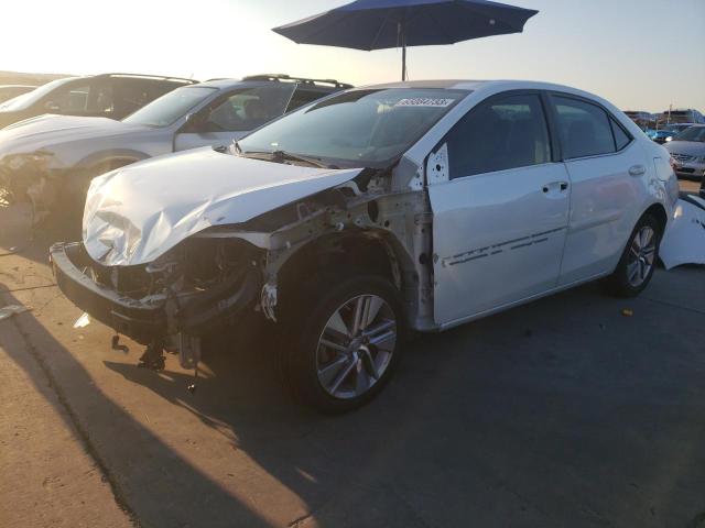 TOYOTA COROLLA EC 2014 with VIN 5YFBPRHE5EP023358 - Photo from auction