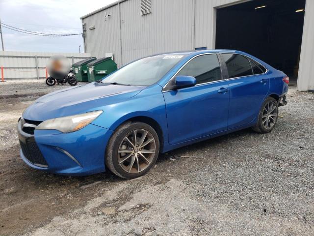 TOYOTA CAMRY LE 2017 with VIN 4T1BF1FK8HU718269 - Photo from auction