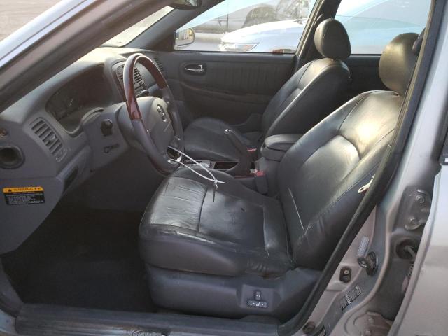 Photo 7 from auction – 2003 KIA OPTIMA LX with VIN KNAGD126935237388