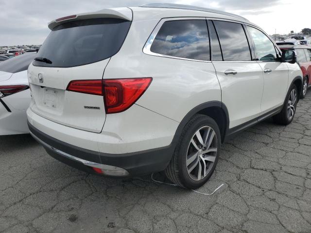 Photo 3 from auction – 2018 HONDA PILOT TOUR with VIN 5FNYF5H95JB030843
