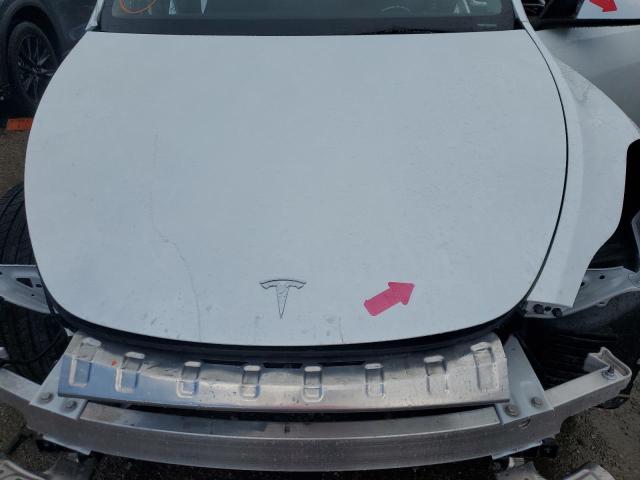 Photo 11 from auction – 2023 TESLA MODEL Y with VIN 7SAYGDEE5PA130586