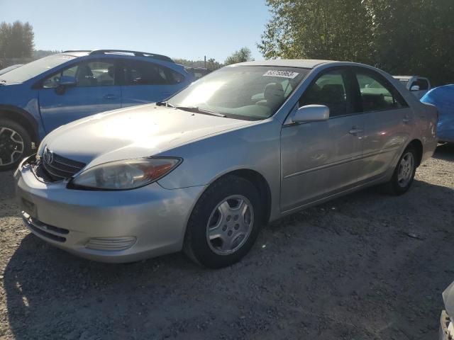 TOYOTA CAMRY LE 2003 with VIN 4T1BF32KX3U039422 - Photo from auction