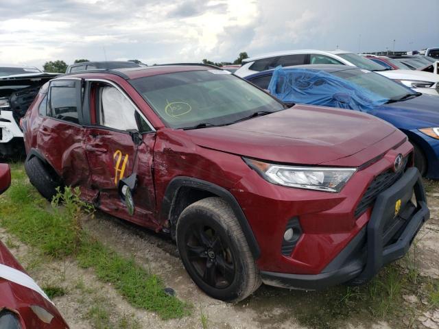 Photo 4 from auction – 2019 TOYOTA RAV4 XLE with VIN JTMP1RFV5KD018556