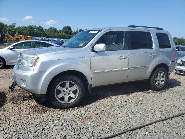 HONDA PILOT TOUR 2011 with VIN 5FNYF4H98BB097514 - Photo from auction