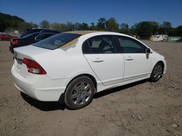 Photo 3 from auction – 2011 HONDA CIVIC LX with VIN 19XFA1F50BE027323