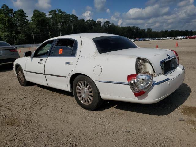 Photo 2 from auction – 2004 LINCOLN TOWN CAR E with VIN 1LNHM81W64Y627796