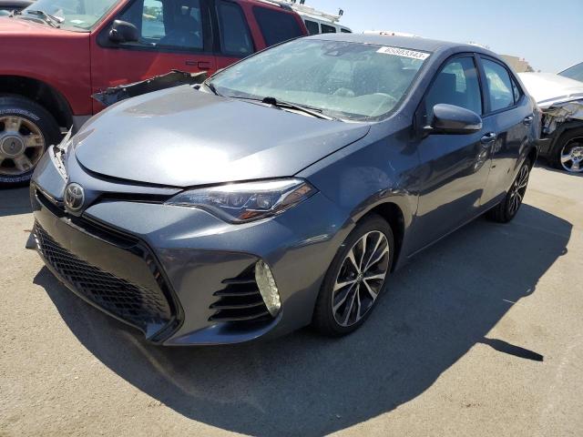 TOYOTA COROLLA L 2017 with VIN 5YFBURHE0HP667721 - Photo from auction