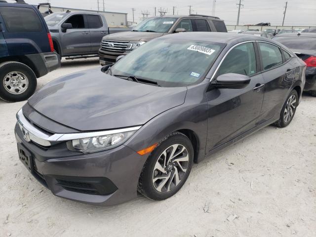 HONDA CIVIC EX 2018 with VIN 2HGFC2F74JH570390 - Photo from auction