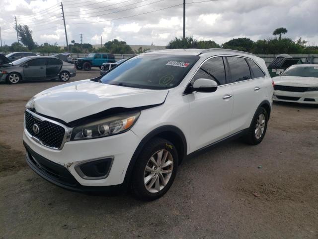 KIA SORENTO LX 2016 with VIN 5XYPG4A33GG090940 - Photo from auction