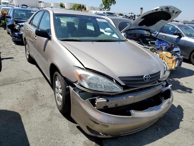 Photo 4 from auction – 2002 TOYOTA CAMRY LE with VIN JTDBE30K820047843