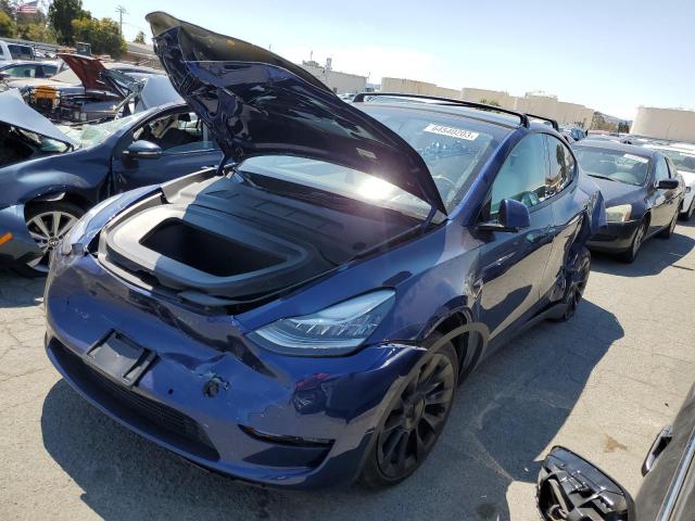 TESLA MODEL Y 2022 with VIN 7SAYGAEE2NF396663 - Photo from auction