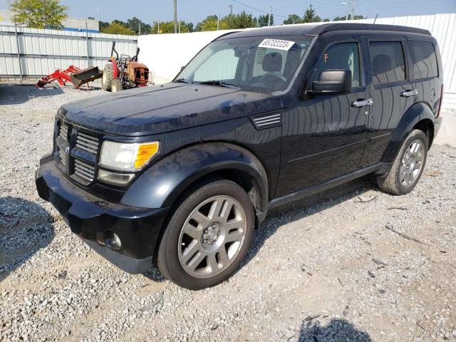 DODGE NITRO HEAT 2011 with VIN 1D4PT4GXXBW570669 - Photo from auction