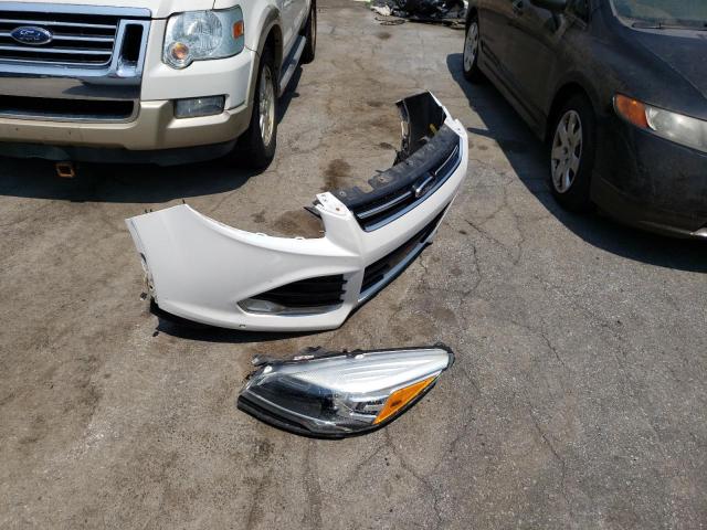 Photo 12 from auction – 2015 FORD ESCAPE TIT with VIN 1FMCU9J91FUC08226