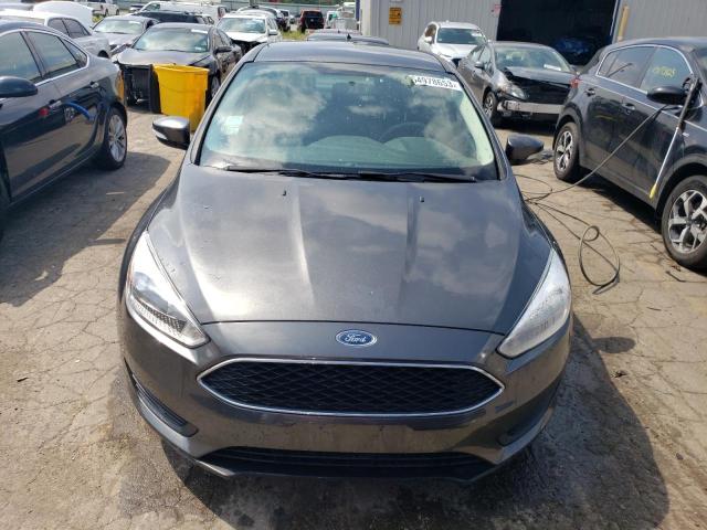 Снимка 5 от търг – 2018 FORD FOCUS SE с VIN 1FADP3FE7JL227743