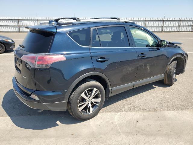 Photo 3 from auction – 2017 TOYOTA RAV4 XLE with VIN JTMWFREVXHD100953