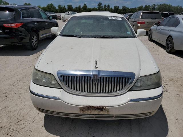 Photo 5 from auction – 2004 LINCOLN TOWN CAR E with VIN 1LNHM81W34Y660156