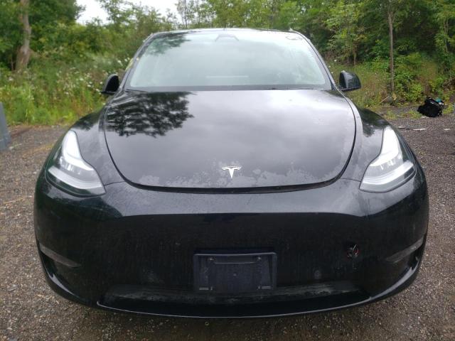 Photo 5 from auction – 2022 TESLA MODEL Y with VIN 7SAYGDEE2NF511893