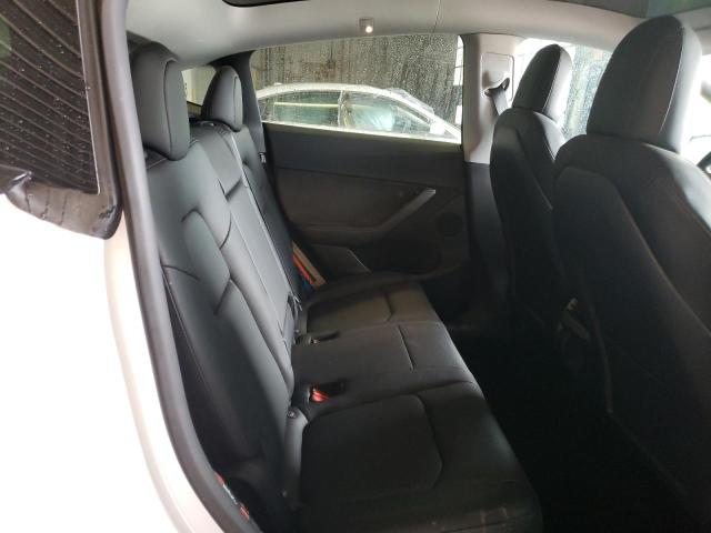 Photo 10 from auction – 2022 TESLA MODEL Y with VIN 7SAYGDEE3NF422544