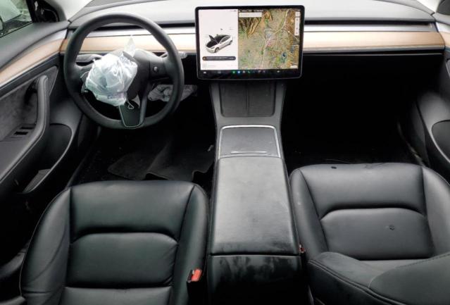 Снимка 8 от търг – 2021 TESLA MODEL 3 с VIN 5YJ3E1EA2MF997614
