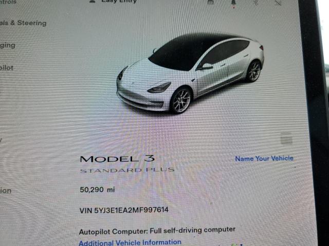Снимка 9 от търг – 2021 TESLA MODEL 3 с VIN 5YJ3E1EA2MF997614