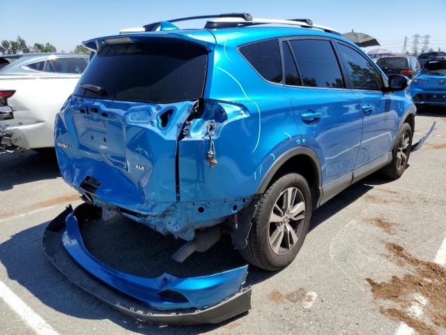 Photo 3 from auction – 2016 TOYOTA RAV4 XLE with VIN JTMWFREV2GJ069021