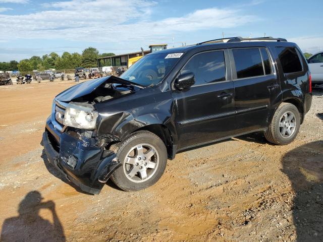 HONDA PILOT TOUR 2011 with VIN 5FNYF4H91BB089335 - Photo from auction