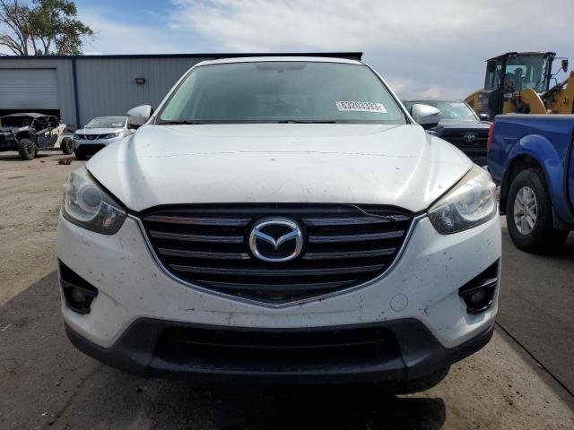 Photo 5 from auction – 2016 MAZDA CX-5 TOURI with VIN JM3KE2CY9G0850038