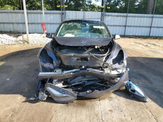 Photo 5 from auction – 2022 TESLA MODEL 3 with VIN 5YJ3E1EB4NF159143