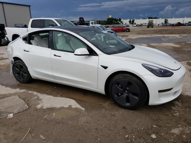 Photo 4 from auction – 2022 TESLA MODEL 3 with VIN 5YJ3E1EBXNF347908