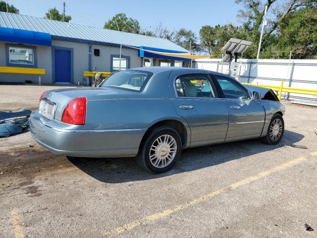 Photo 3 from auction – 2004 LINCOLN TOWN CAR E with VIN 1LNHM81W54Y631144