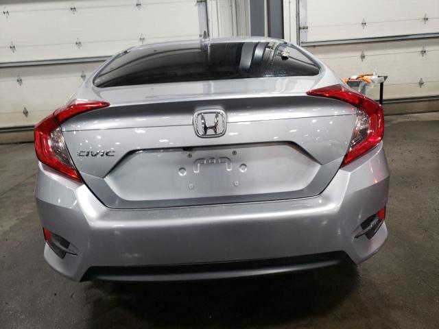 Photo 6 from auction – 2018 HONDA CIVIC EX with VIN 19XFC2F76JE018030