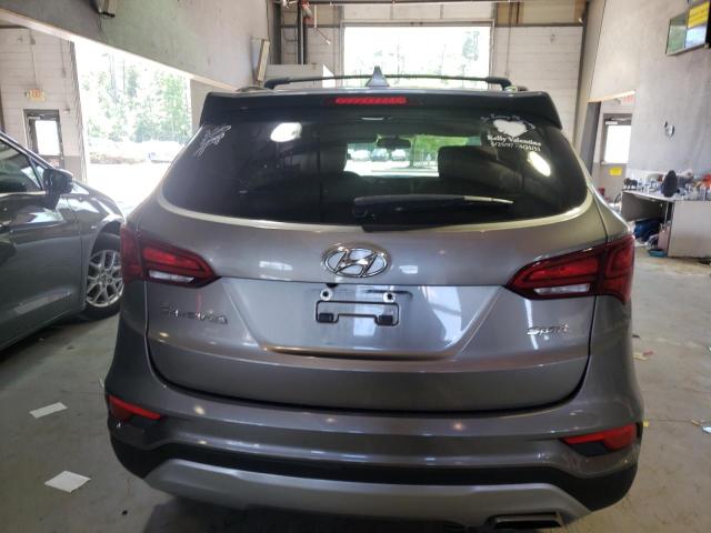 Photo 6 from auction – 2018 HYUNDAI SANTA FE S with VIN 5NMZU3LB9JH066994
