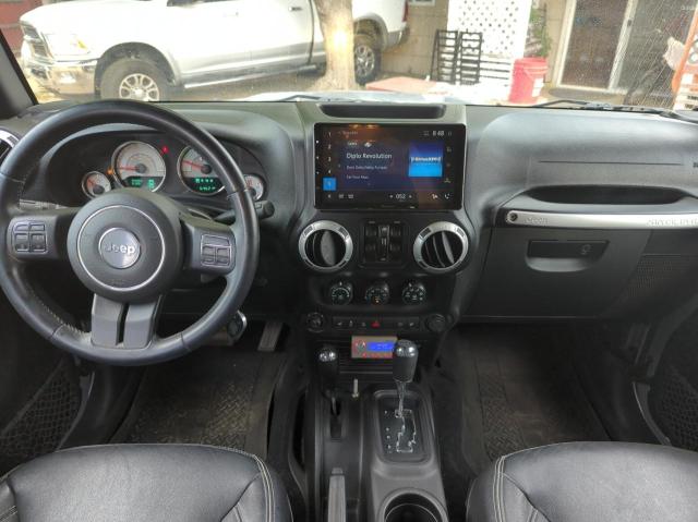 Фото 9 с аукциона – 2015 JEEP WRANGLER U с VIN 1C4HJWFG1FL656013
