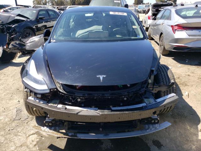 Photo 5 from auction – 2021 TESLA MODEL 3 with VIN 5YJ3E1EA2MF092211