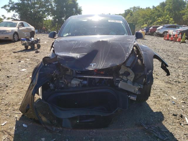 Photo 5 from auction – 2022 TESLA MODEL Y with VIN 7SAYGDEF2NF387990
