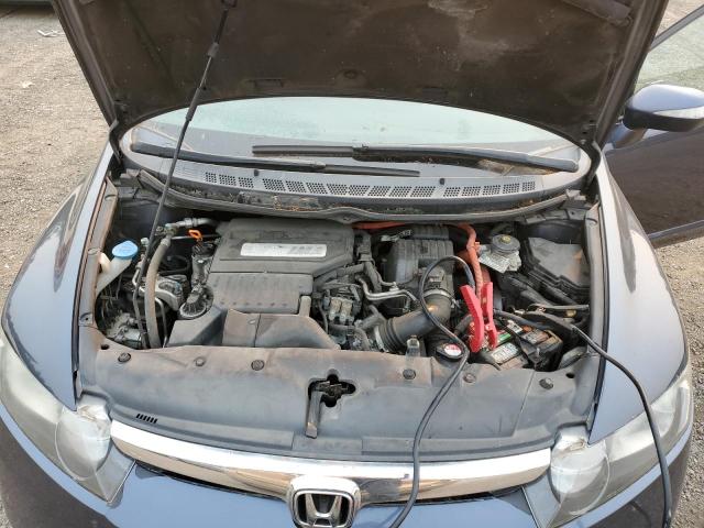 Photo 11 from auction – 2007 HONDA CIVIC HYBR with VIN JHMFA36267S031154