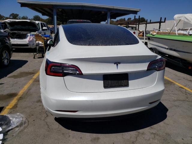 Снимка 6 от търг – 2021 TESLA MODEL 3 с VIN 5YJ3E1EA6MF069420