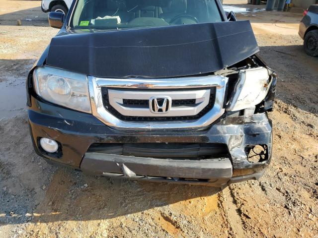 Photo 12 from auction – 2011 HONDA PILOT TOUR with VIN 5FNYF4H91BB089335
