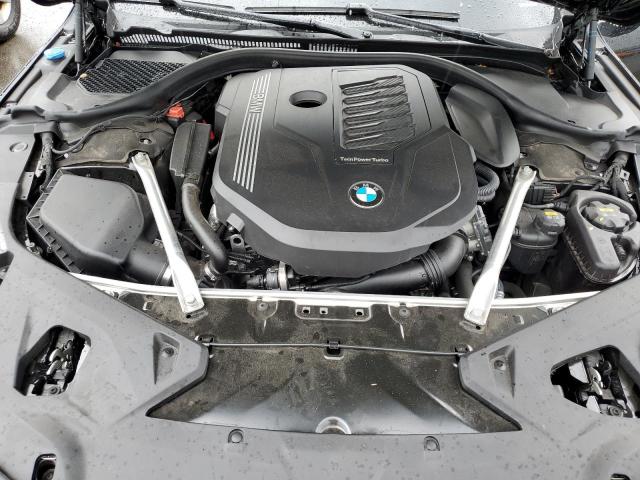Photo 11 from auction – 2022 BMW 840XI with VIN WBAGV4C04NCJ54569