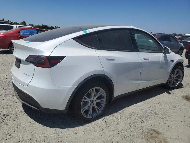 Photo 3 from auction – 2023 TESLA MODEL Y with VIN 7SAYGAEE4PF784576