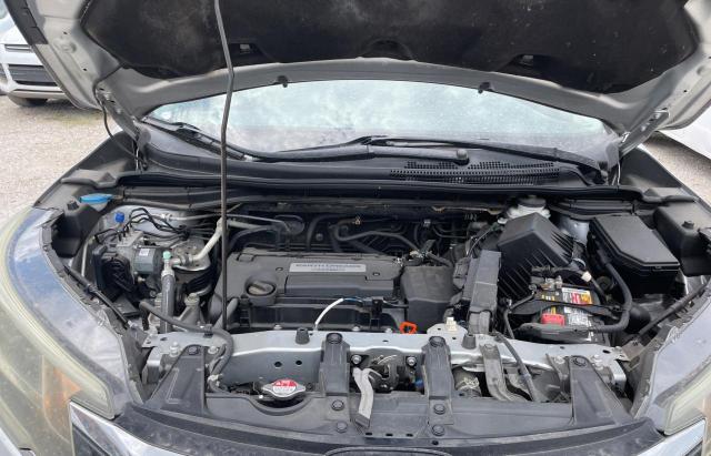 Photo 7 from auction – 2015 HONDA CR-V LX with VIN 3CZRM3H34FG704213