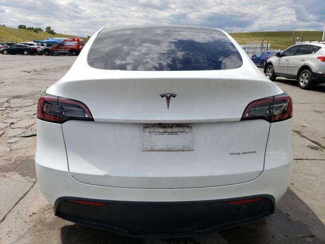 Photo 6 from auction – 2023 TESLA MODEL Y with VIN 7SAYGDEE1PF663277